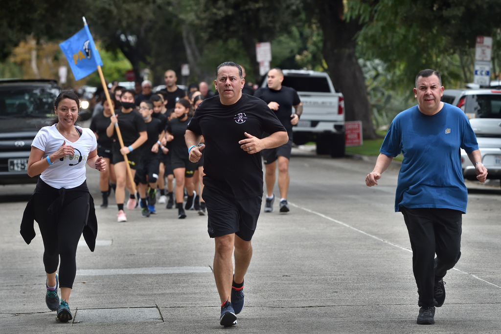31 for 31 fun run Santa Ana officers, families, and supporters run to