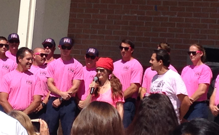 Troy High School English teacher Dorey Madrid addresses the crowd who gathered Wednesday on the campus to support her fight against breast cancer.