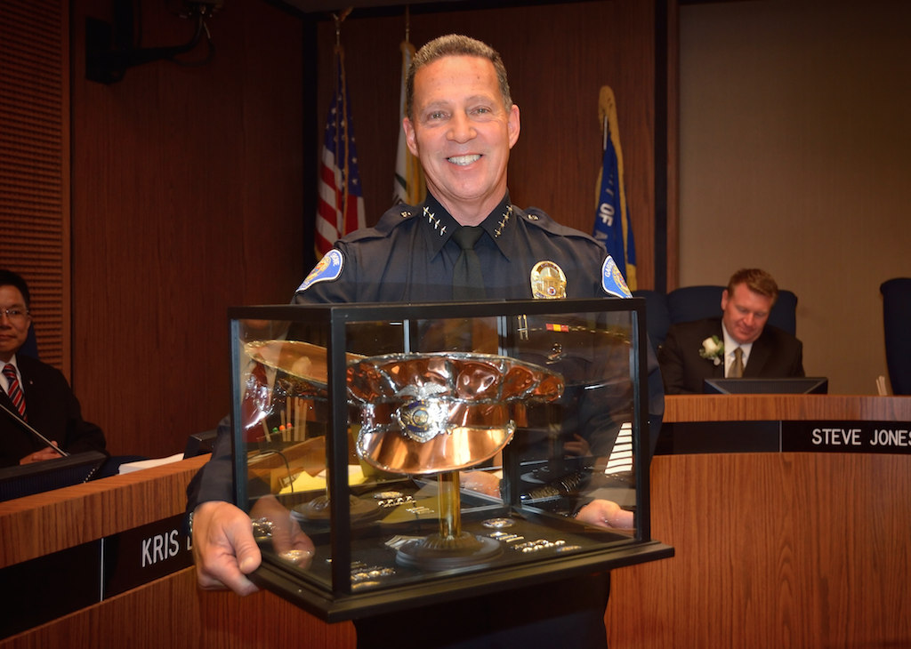 Retiring Garden Grove Chief of Police Kevin Raney is recognized during a city council meeting.