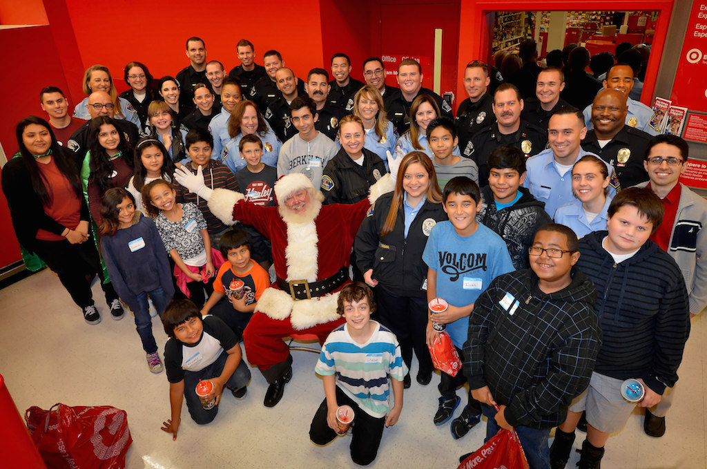 Fullerton PD's Shop with a Cop at the Target store in Fullerton where kids were selected by their school to be treated to a special holiday shopping trip with a police officer.