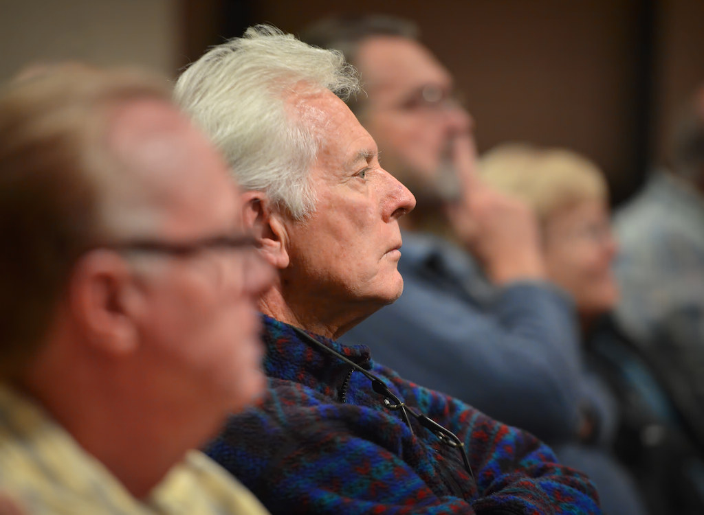 John Craney of Huntington Beach, center, listens to a presentation on ‘Use of Force’ given by the Huntington Beach PD at the Huntington Beach Central Library. Photo by Steven Georges/Behind the Badge OC