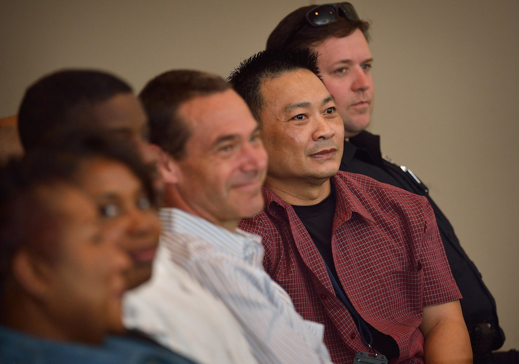 Officer Nick Tran of the Westminster PD, second from right, listens to a talk by Dr. Kevin Gilmartin on emotional survival for law enforcement during a seminar at the Rose Center in Westminster. Photo by Steven Georges/Behind the Badge OC