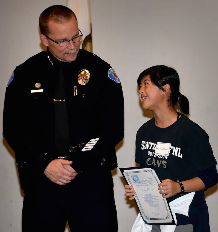 Kayla Tran was honored for assisting officers by translating for them when her grandfather went to the station to report his wife stealing his gun. Turns out he had misplaced the weapon. Photo: Steven Georges
