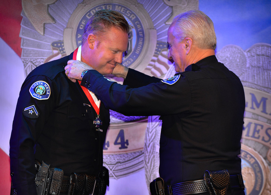 Olin receives his Lifesaving Award. Photo by Steven Georges/Behind the Badge OC