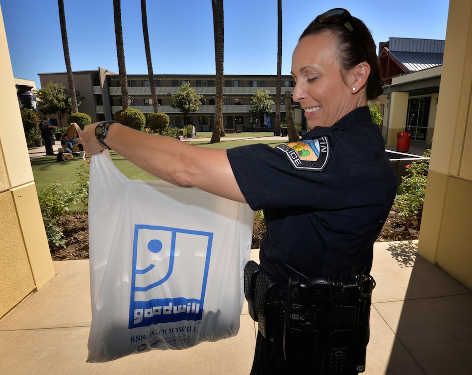 Tustin Police Officer Melissa Trahan brought Beatrice Harvey clothes from the Goodwill of OC Boutique in Tustin. Photo by Steven Georges/Behind the Badge OC