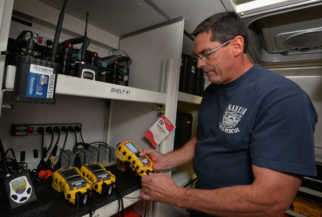 Lagace shows portable chemical detection devices kept in Station 6’s Hazmat truck including the one, in his hand, for chlorine. Photo by Steven Georges/Behind the Badge OC