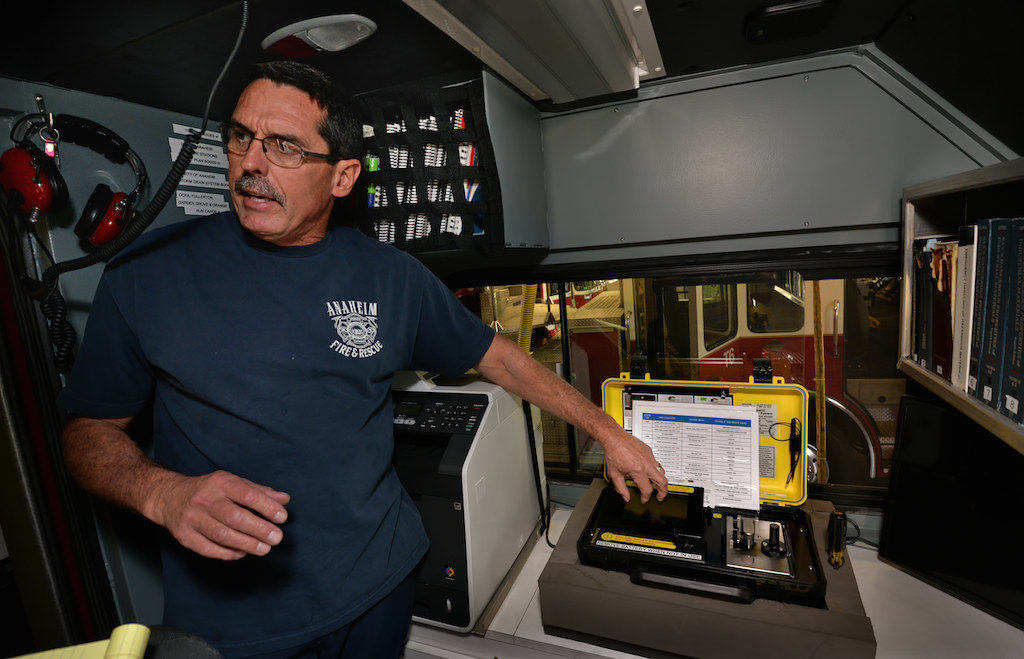 Lagace talks about the chemical detection equipment inside Station 6's mobile hazmat truck. Photo by Steven Georges/Behind the Badge OC
