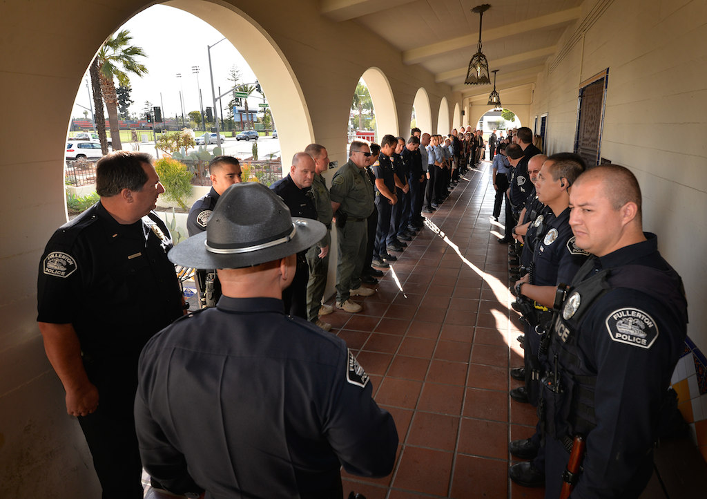 Officers lineup at Fullerton PD’s headquarters to get ready for Sgt. Tak Kim’s Walk of honor, the departments first ever ceremony if it’s kind. Photo by Steven Georges/Behind the Badge OC