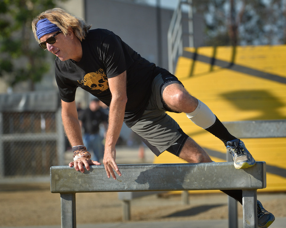 Behind the Badge Senior Writer Greg Hardesty runs through the Garden Grove PD’s obstacle course at the Orange County Sheriff's Regional Training Academy. Photo by Steven Georges/Behind the Badge OC