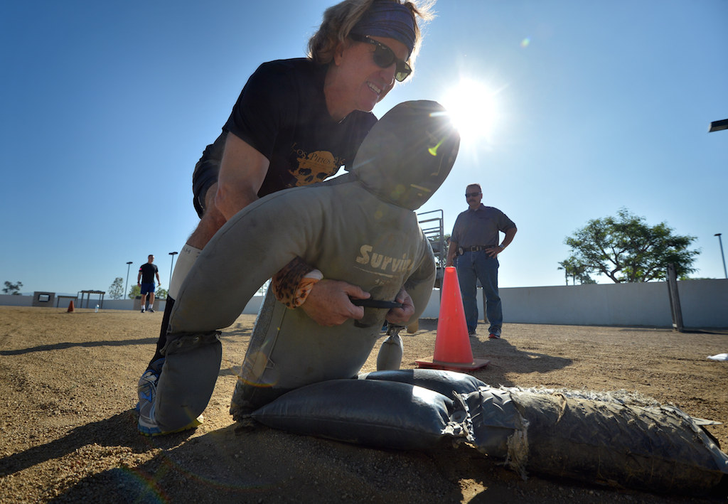 Behind the Badge Senior Writer Greg Hardesty drags a 165 pound dummy 35 feet as part of the Garden Grove PD’s physical agility test at the Orange County Sheriff's Regional Training Academy. Photo by Steven Georges/Behind the Badge OC