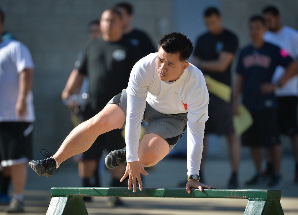 Applicants run through the obstacle course, part of the physical agility test for the Garden Grove PD at the Orange County Sheriff's Regional Training Academy in Tustin. Photo by Steven Georges/Behind the Badge OC