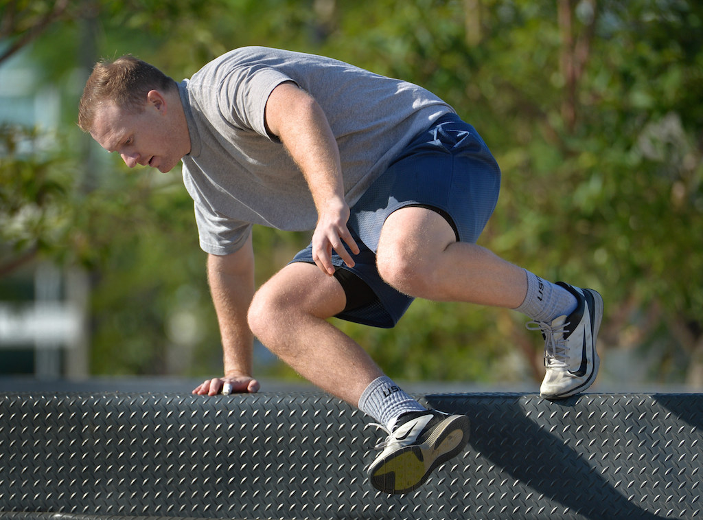 Applicants run through the obstacle course, part of the physical agility test for the Garden Grove PD at the Orange County Sheriff's Regional Training Academy in Tustin. Photo by Steven Georges/Behind the Badge OC