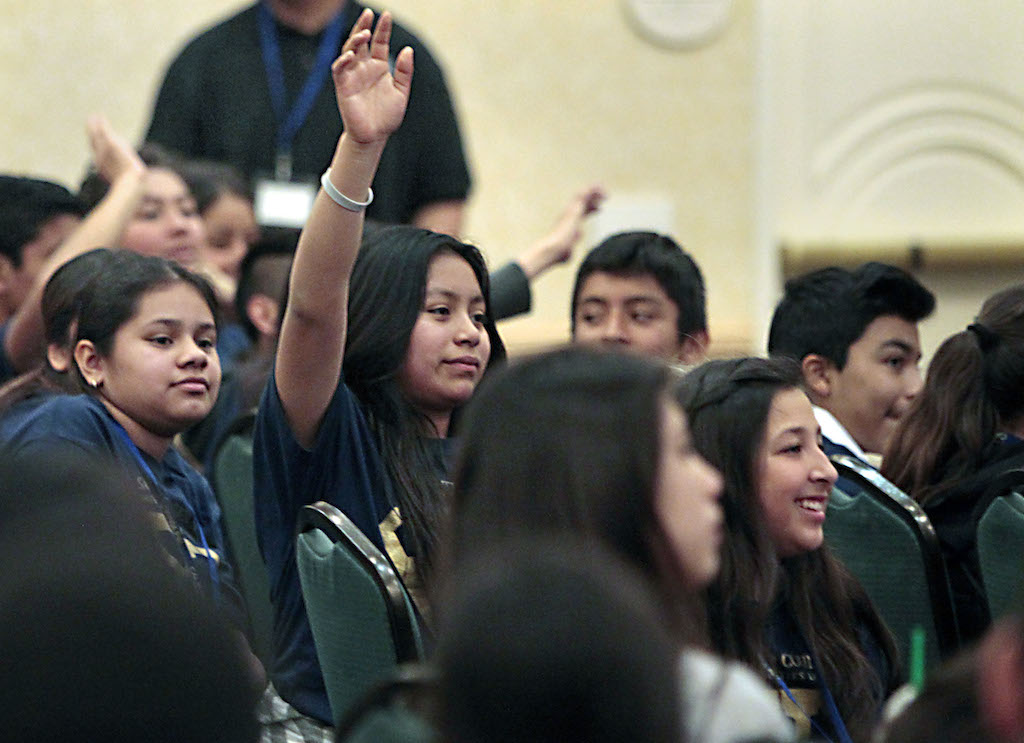 Students listen to a speech by Anaheim Chief of Police Raul Quezada  at the Youth Leadership Academy. Photo by Christine Cotter/Behind the Badge OC