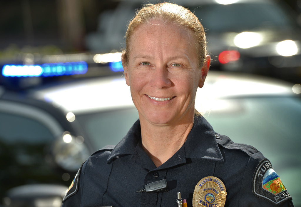 Officer Bonnie Breeze of the Tustin PD was flagged down while transporting a prisoner to stop and help save a man by using CPR. Photo by Steven Georges/Behind the Badge OC