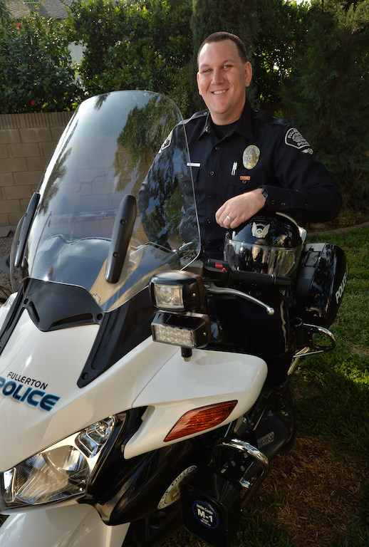 Fullerton PD Motor Officer Kyle Baas on his Fullerton PD motorcycle, a Honda St-1300 Police Model. “It’s the greatest job in the world,” said Bass, “I get paid to ride around on bikes.” Photo by Steven Georges/Behind the Badge OC