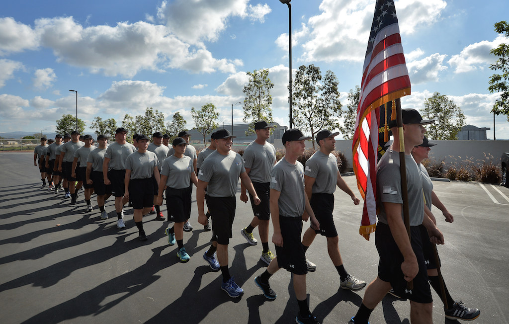Members of the police academy march back to the the Orange County Sheriff's Regional Training Academy in Tustin at the end of a 3-mile run on the last day of training before graduation. Photo by Steven Georges/Behind the Badge OC