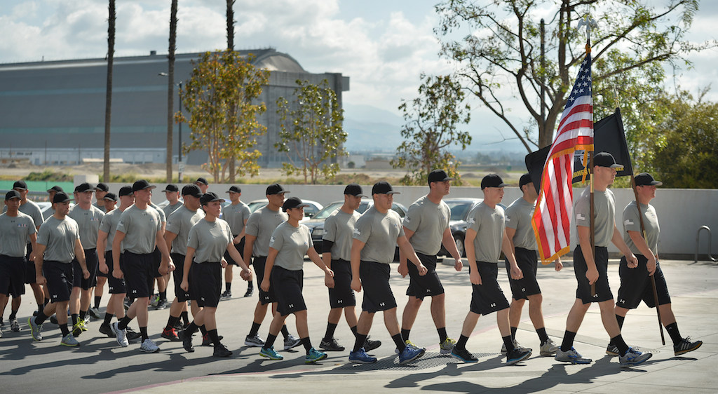 Members of the police academy march back to the the Orange County Sheriff's Regional Training Academy in Tustin at the end of a 3-mile run on the last day of training before graduation. Photo by Steven Georges/Behind the Badge OC