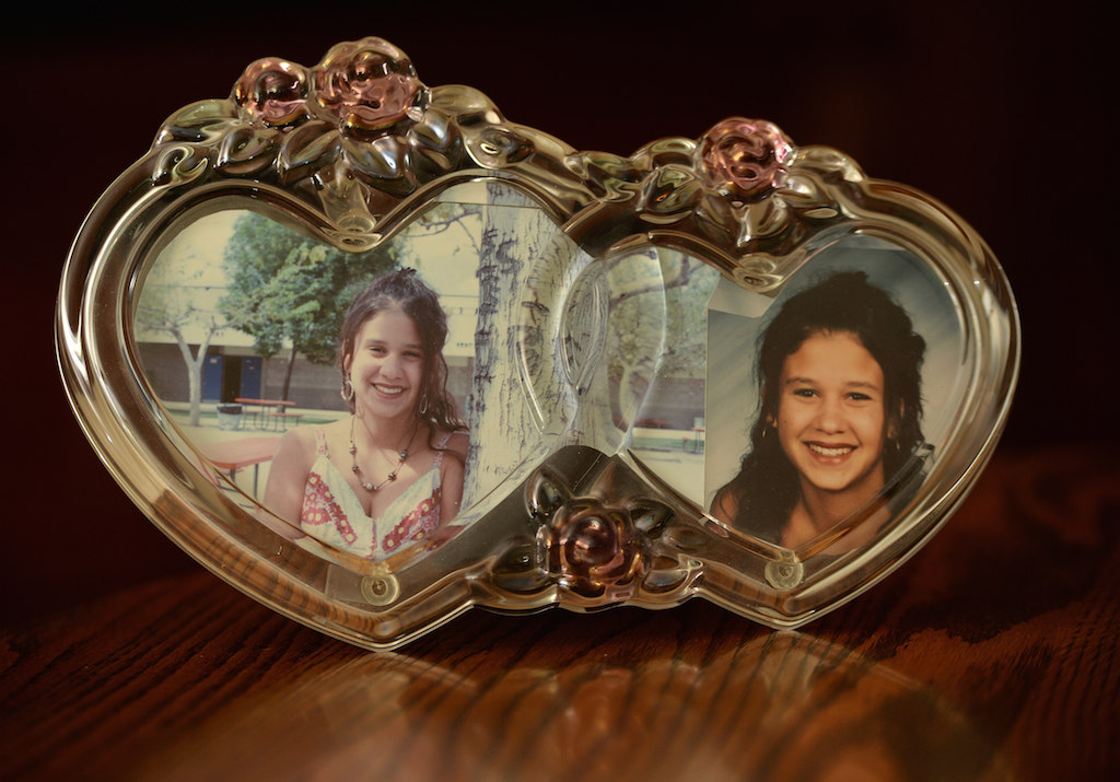 Family photos of Allison Saliture who was killed at age 16 by a drunk driver in 1994. The photo on the left was taken the day before the accident. Photo by Steven Georges/Behind the Badge OC
