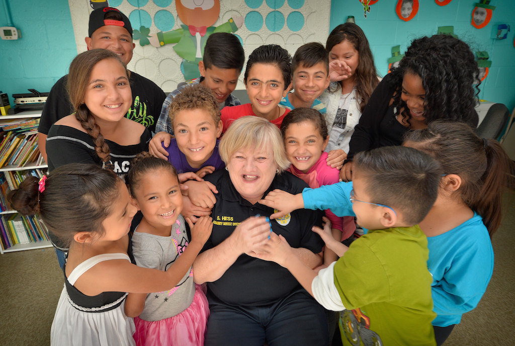 The kids have a little fun as they gather for one last photo with Sherry Hess. Photo: Steven Georges