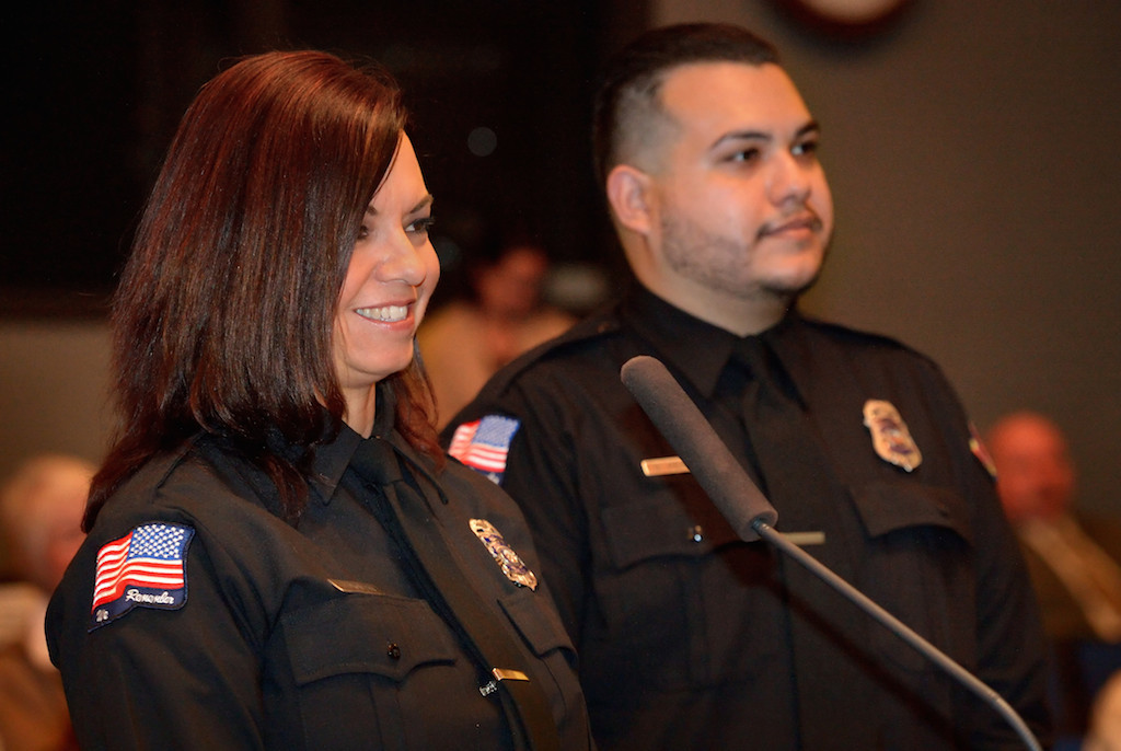 Lead Dispatcher Tracy Nolan, left, and Fire Dispatcher II Steven Perez of Metro Cities Fire Authority are honored before the Anaheim City Council as the council issues a proclamation designating April 12-18, 2015 as National Public Safety Telecommunicators Week. Photo by Steven Georges/Behind the Badge OC