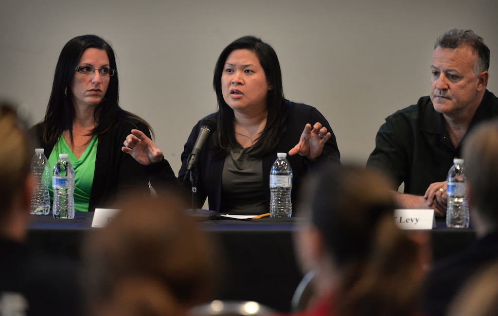 Tina Rocha, Crisis Response Program Specialist, Orange County Department of Education, center, talks on a panel discussion on mental health and how they are handled by law enforcement with Heather Williams, left, and Josef Levy, right. Photo by Steven Georges/Behind the Badge OC