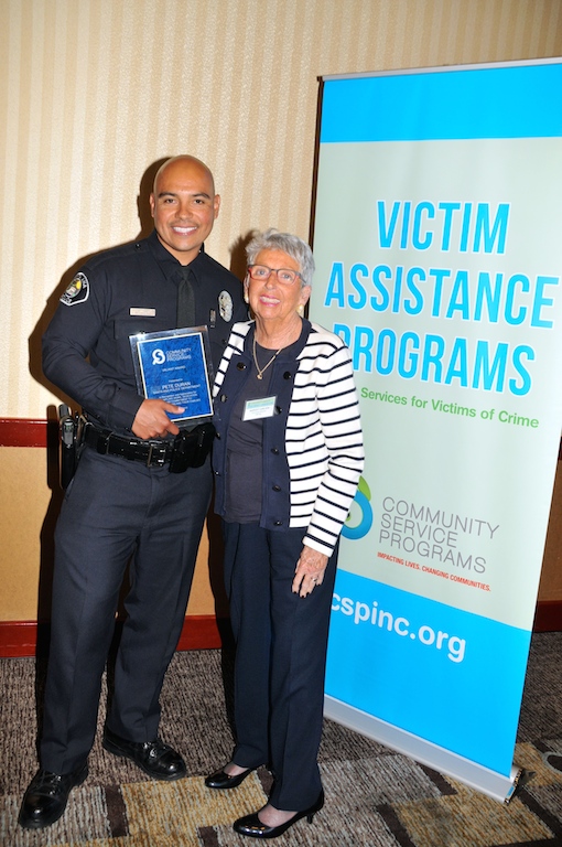 Community Service Programs Victims' Rights Conference Valiant Award honoree Det. Pete Duran of the Santa Ana Police Department with Margot Carlson, executive director of Community Service Programs (CSP). Photo courtesy of CSP 