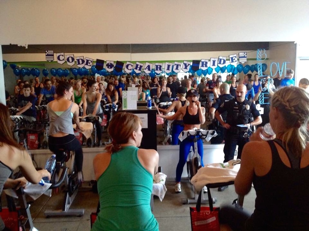 Fitness instructor Lacey Heidelman leads a spinning class to raise money for the annual Memorial Ride. The February event brought in $2,000. 