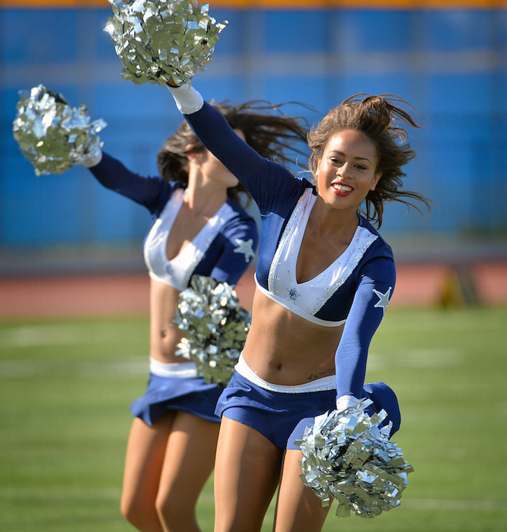 The Lawgirls do a cheer during halftime during Freedom Bowl II at Bradford Stadium benefiting Special Olympics Southern California. Photo by Steven Georges/Behind the Badge OC