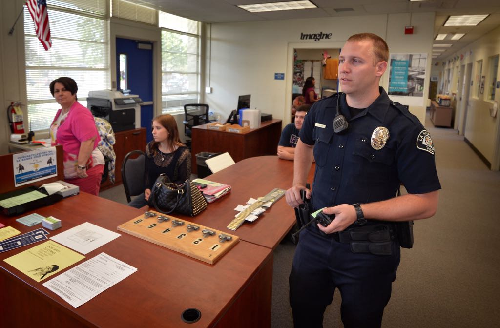La Habra PD Officer Justin Bender in the office at La Habra High School where he once attended as a student. Photo by Steven Georges/Behind the Badge OC