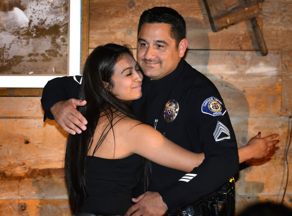 Explorer Sgt. Allyson Burillo gets a hug from her father, Garden Grove Sgt. Richard Burillo, as she receives the Supervisor of the Year award during the Garden Grove Police Explorer Post 1020 Awards Banquet. Photo by Steven Georges/Behind the Badge OC