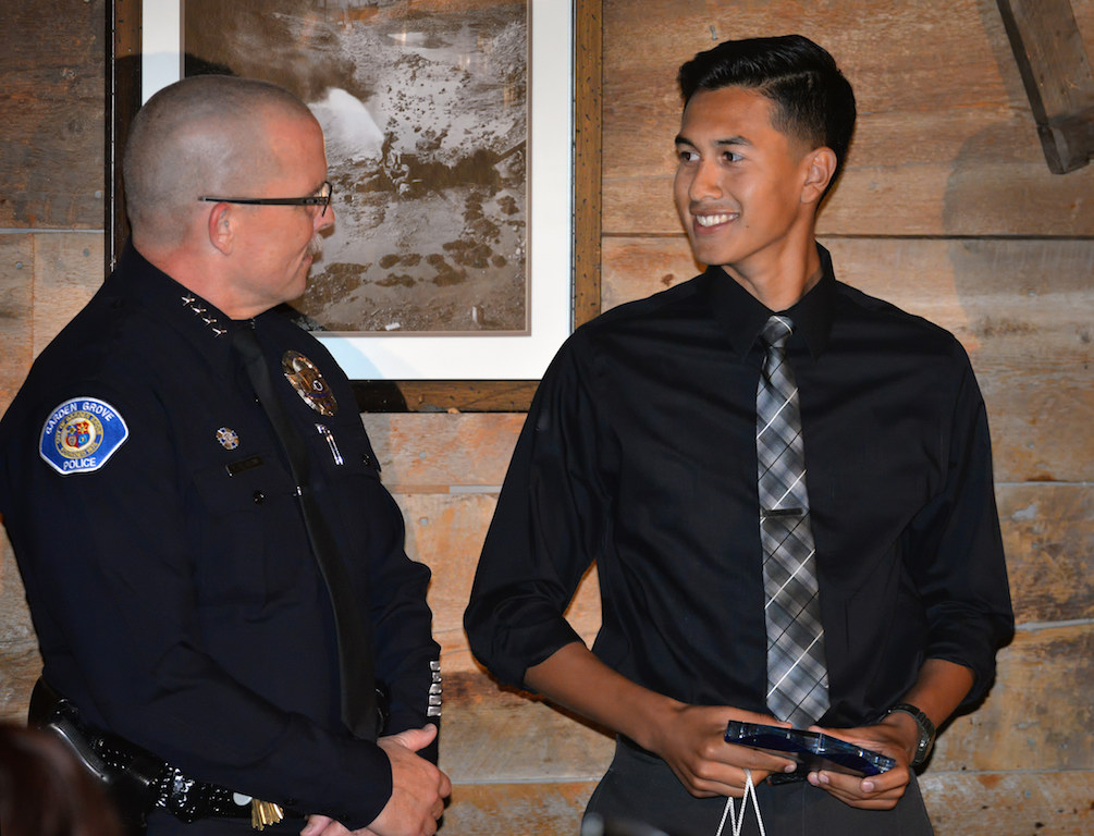 Explorer Cpl. Daniel Alvarez receives the Most Inspirational Award from Police Chief Todd Elgin during the Garden Grove Police Explorer Post 1020 Awards Banquet. Photo by Steven Georges/Behind the Badge OC