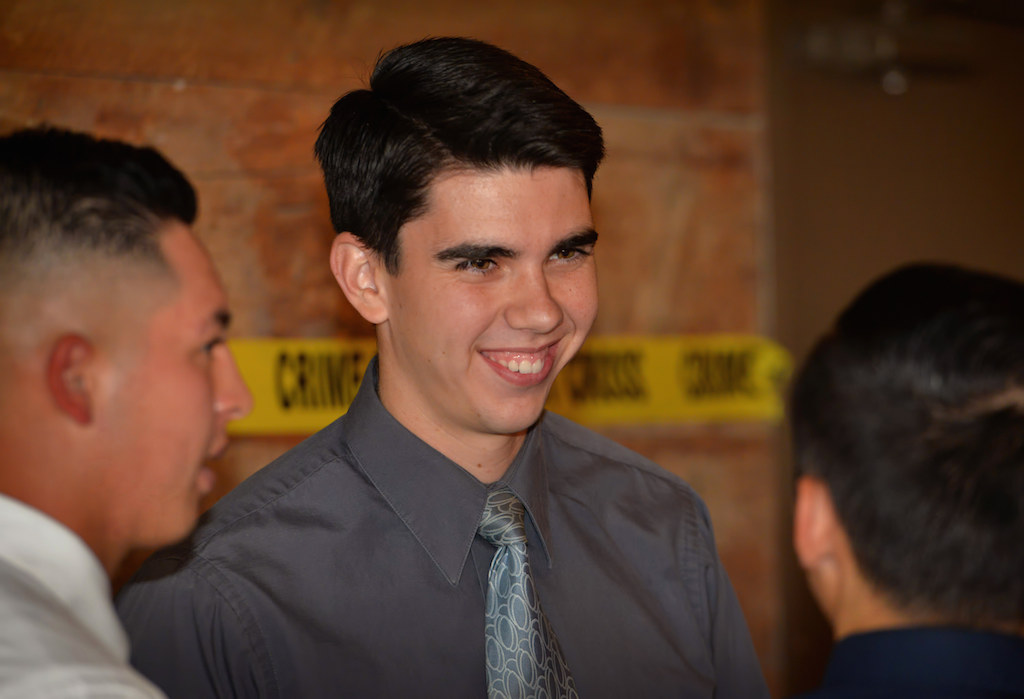 Explorer Sgt. Richard Weston, who would later be named Explorer of the Year, smiles with his friends during the Grove Police Explorer Post 1020 Awards Banquet. Photo by Steven Georges/Behind the Badge OC