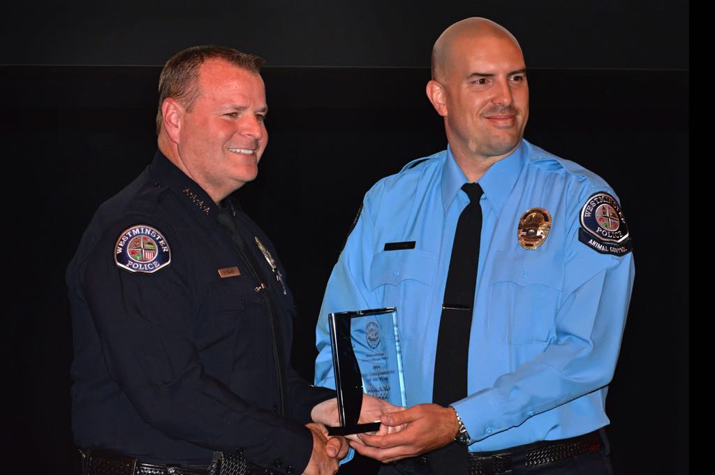 Animal Control Officer Ronald Perez is awarded Part-Time Employee of the Year by Chief Kevin Baker during the 2014 Westminster PD Awards Ceremony. Photo by Steven Georges/Behind the Badge OC