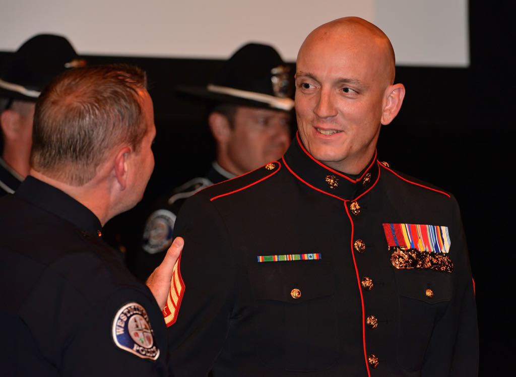 Officer Jeremy Fletcher accepts the Top Shot Award at the annual ceremony. Photo by Steven Georges/Behind the Badge OC