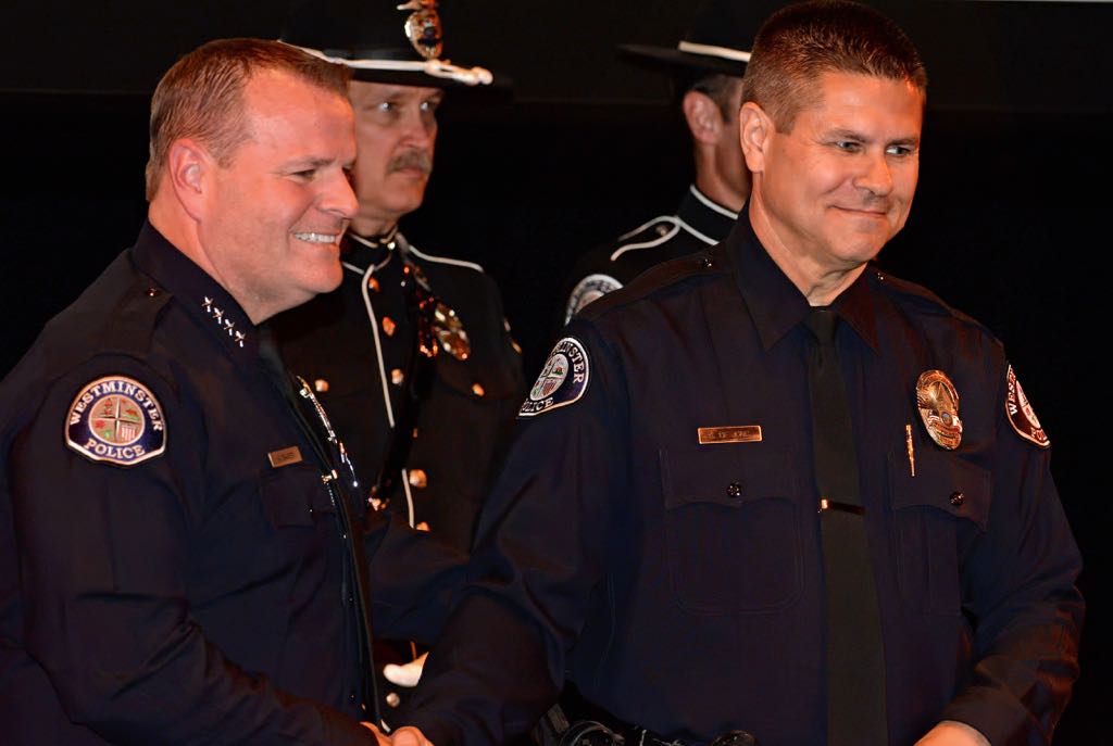 Officer Stewart DeJong receives the MADD Award from Chief Kevin Baker during the 2014 Westminster PD Awards Ceremony. Officer Jerad Kent, not in photo, also received the award. Photo by Steven Georges/Behind the Badge OC