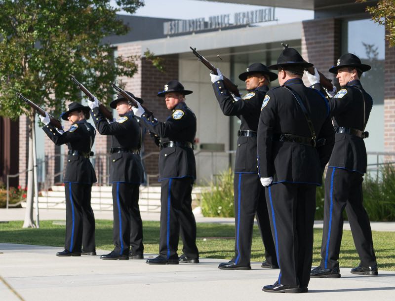 Members of the Irvine Police Department perform a 21-gun salute at the annual Westminster Police memorial ceremony. Photo by Jim Banks/Behind the Badge OC 