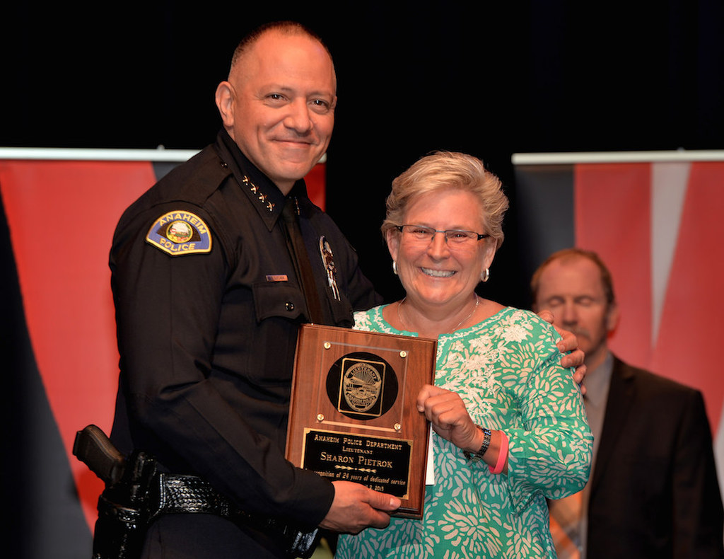 Lt. Sharon Pietrok receives recognition of 24 years of service during Anaheim PD’s 2015 Awards and Retirement Ceremony. Photo by Steven Georges/Behind the Badge OC