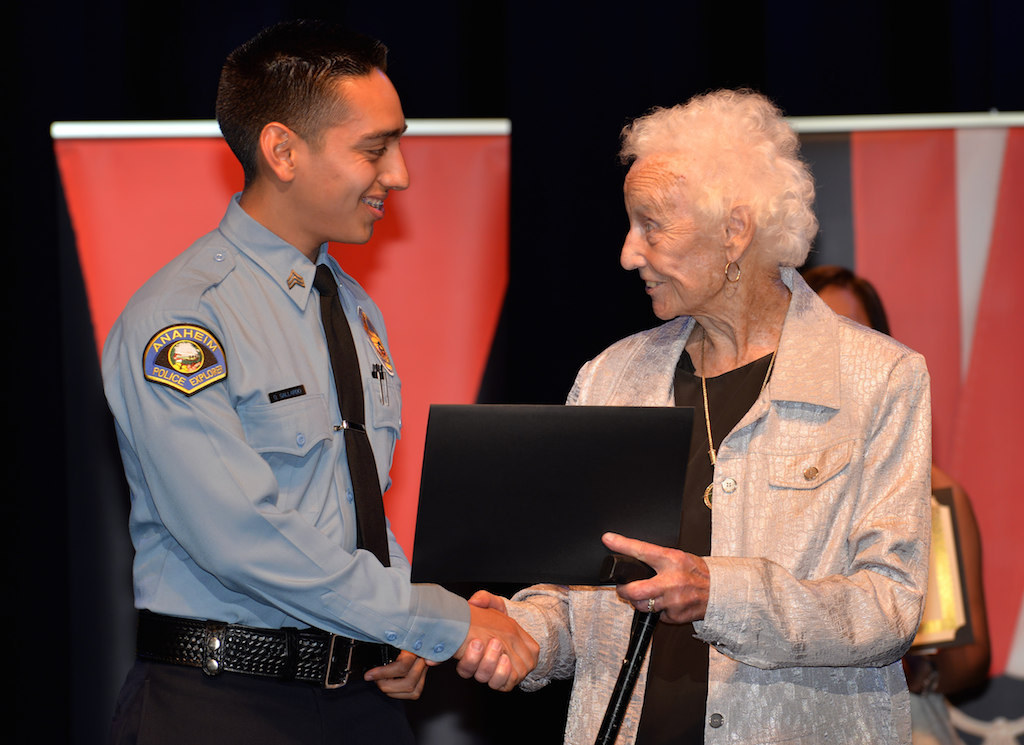Anaheim PD Explorer Omar Gallardo receives the Dr. Alice Grant Scholarship. Photo by Steven Georges/Behind the Badge OC
