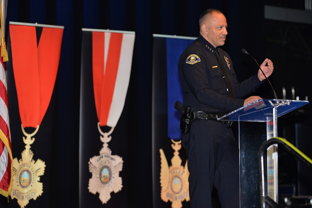 Anaheim Police Chief Raul Quezada talks about those receiving awards during Anaheim PD’s 2015 Awards and Retirement Ceremony. Photo by Steven Georges/Behind the Badge OC
