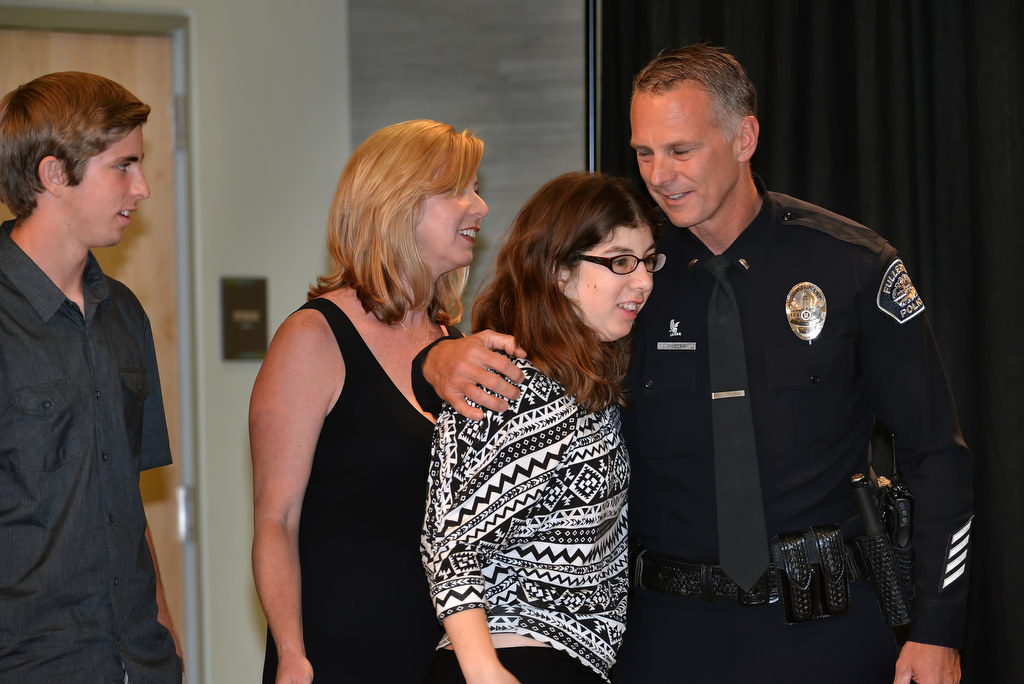 Mike Chocek stands with his kids Chrissy & Chase and his wife Teresa during Fullerton PD’s Promotions and Awards Ceremony. Photo by Steven Georges/Behind the Badge OC