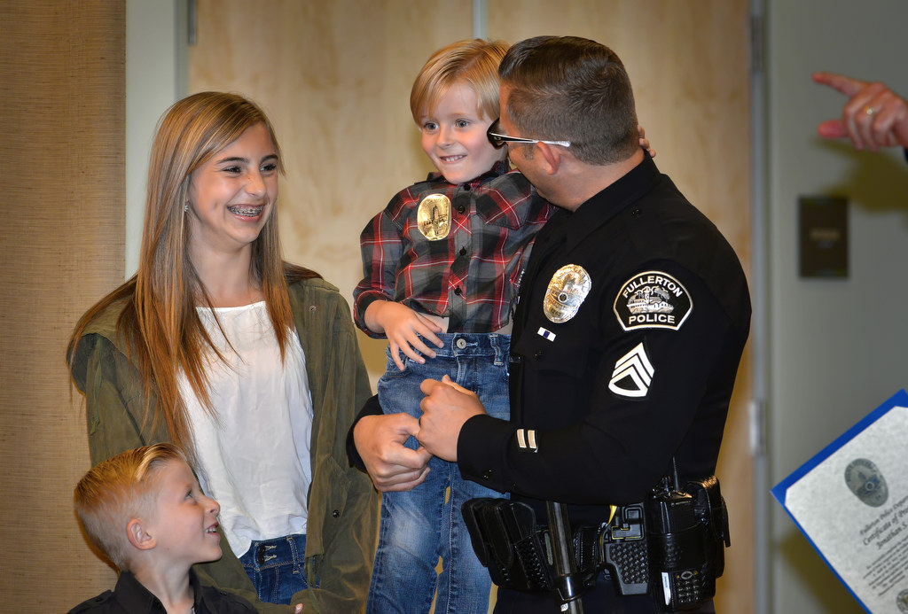 Everyone says happy birthday to Jax as his dad Jon Radus receives his new badge for the rank of Sergeant during Fullerton PD’s Promotions and Awards Ceremony. Photo by Steven Georges/Behind the Badge OC
