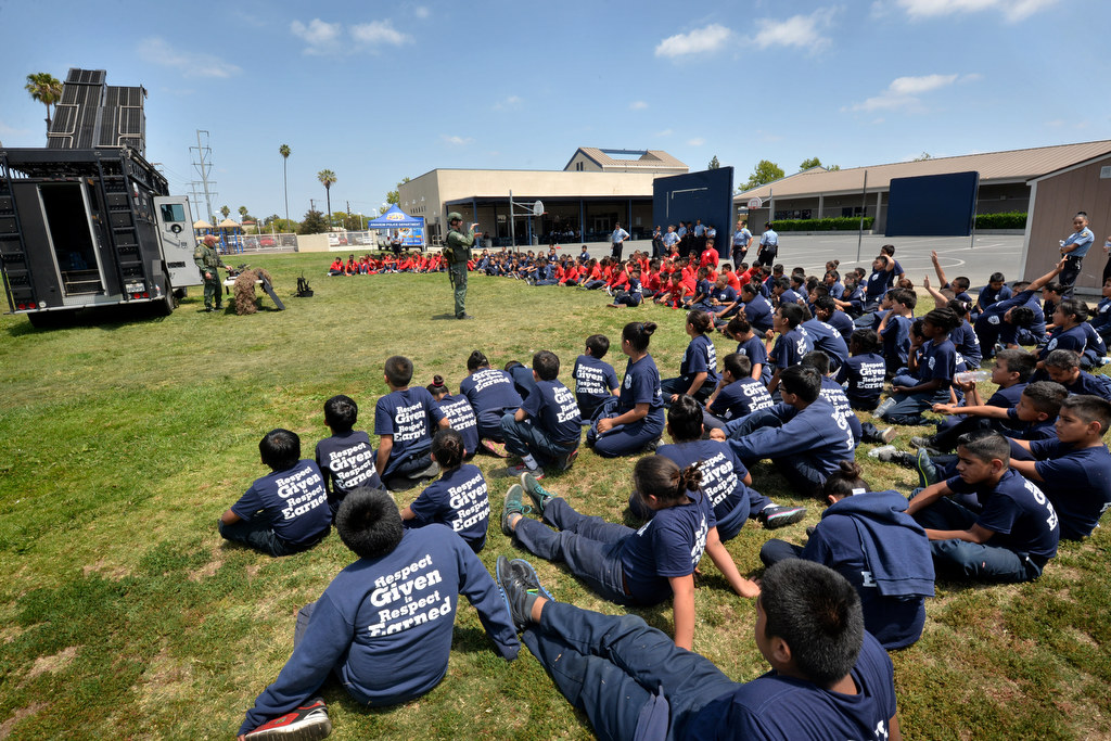Junior cadets gather for a SWAT demonstration during Anaheim PD Cops 4 Kids Jr. Cadet Academy at Betsy Ross Elementary. Photo by Steven Georges/Behind the Badge OC