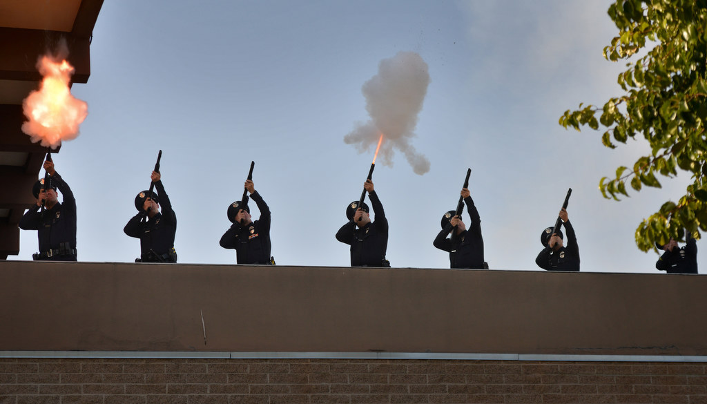 A 21 Gun Salute honoring the five Garden Grove fallen officers is fired off on the roof of the police department during Garden Grove PD’s 28th Annual “Call to Duty” Memorial Service. Photo by Steven Georges/Behind the Badge OC