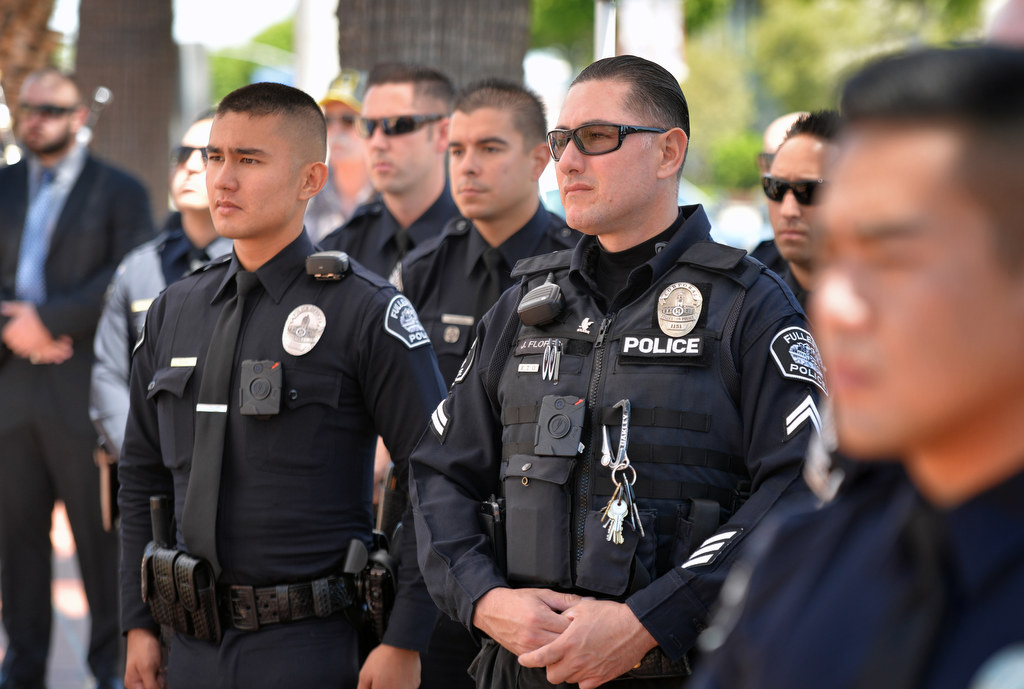 Fullerton Police officers attend a memorial for fallen officer Tommy De La Rosa, 25 years after he was killed in the line of duty on June 21, 1990. Photo by Steven Georges/Behind the Badge OC