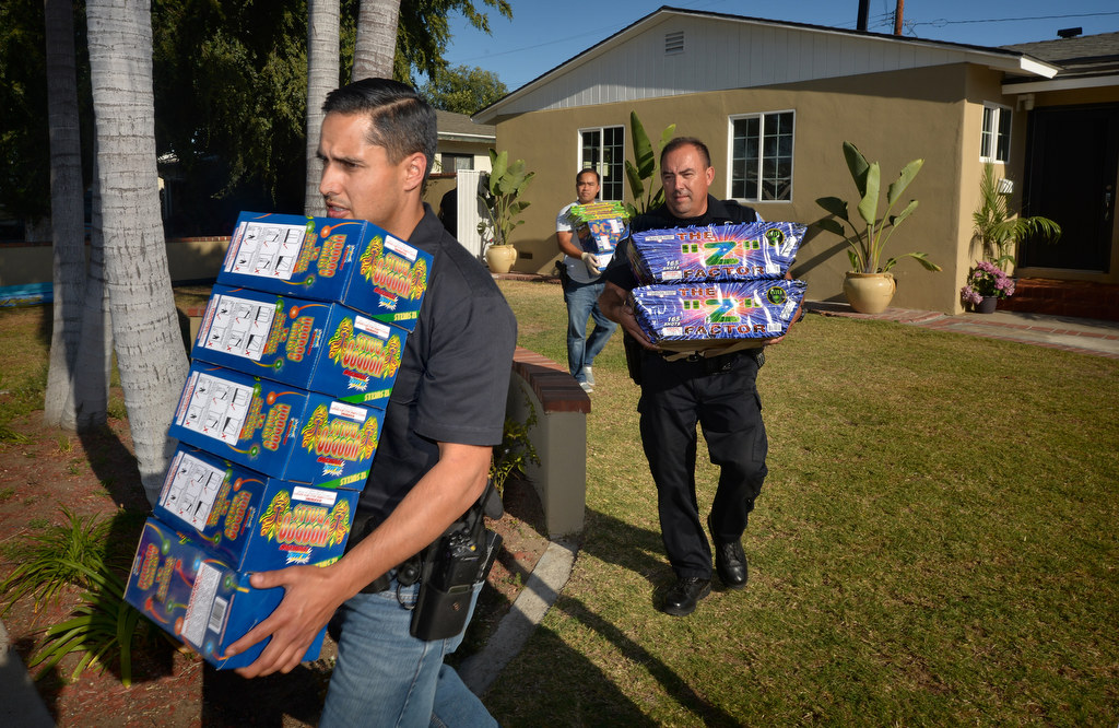 Garden Grove Police and Fire confiscate over a thousand pounds of illegal fireworks with a street value of close to $10,000 from a home on the 9700 block of Dakota Ave. in Garden Grove after the owner was arrested on felony charges. Photo by Steven Georges/Behind the Badge OC