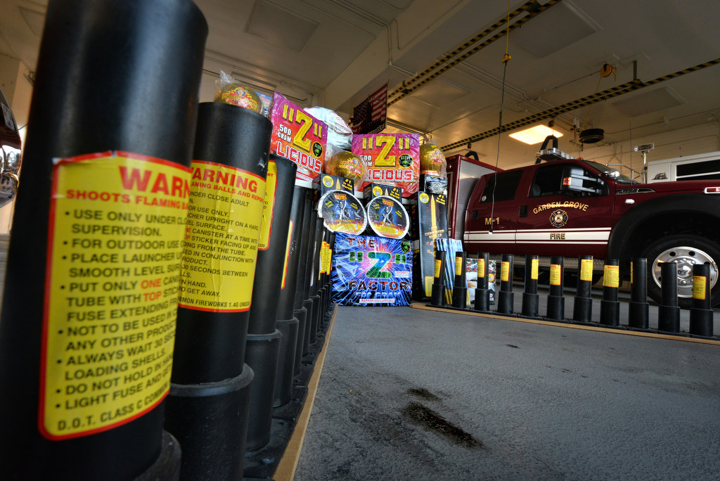 A portion of the illegal fireworks confiscated from a home in Garden Grove with a street value of close to $10,000 was put on display at Garden Grove Fire Department Station 1 Headquarters for a press conference. In Garden Grove, only fireworks designated as “Save and Sane” are allowed in the city during the 4th of July season. Photo by Steven Georges/Behind the Badge OC