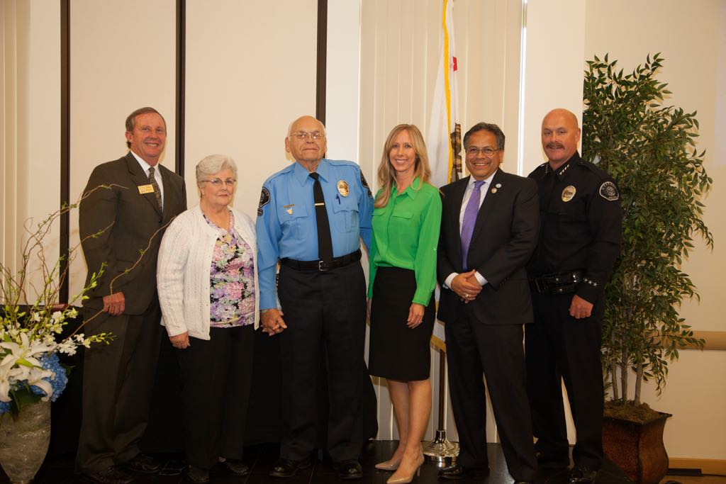Members of the Cypress City Council say "thank you" to volunteer Wayne Schoemann, who has logged more than 4,000 hours with the Cypress Police Department. Photo courtesy Cypress PD. 