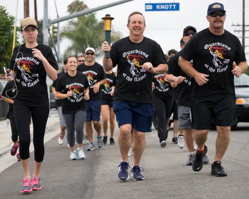 Members of the Cypress Police Department participated in the annual Special Olympics torch run to welcome athletes to the summer games. Photo by Jim Banks/Behind the Badge OC. 