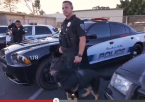 Officer Hughes and Perro
