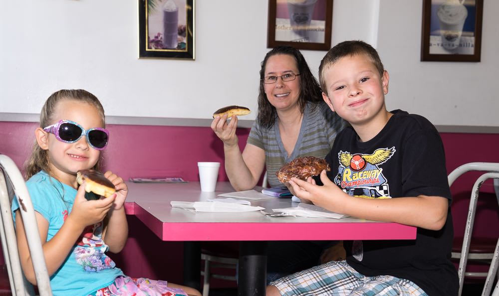 Families dined on donuts at the monthly Coffee with a Cop event. Photo by Jim Banks/Behind the Badge OC. 